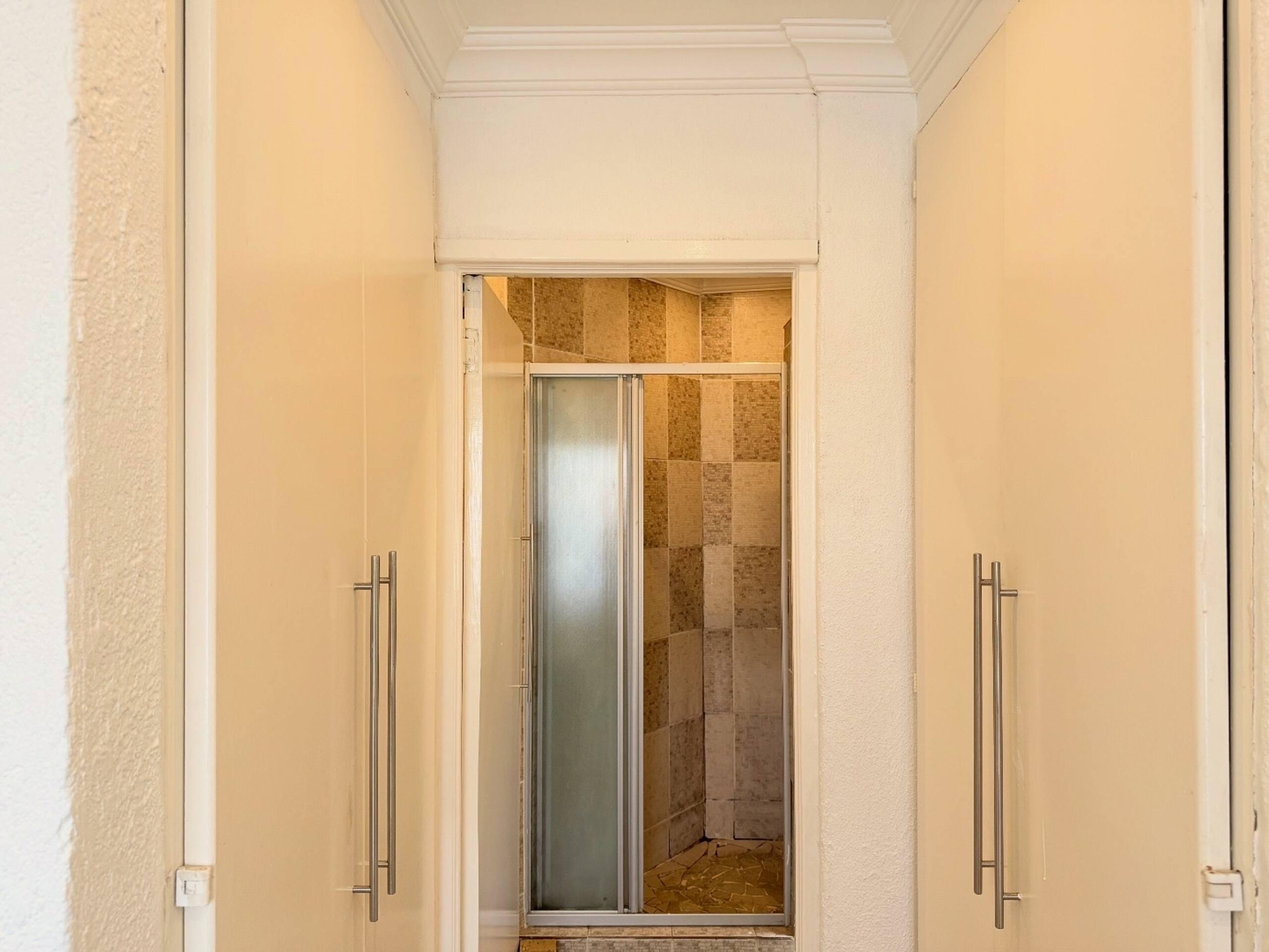 Shower room with frosted glass door